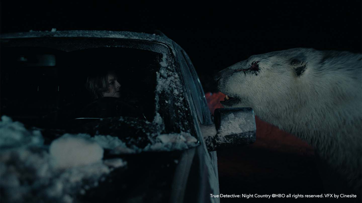 CG polar bear looking into car window in True Detective: Night Country